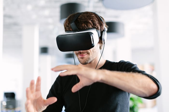 man using virtual reality headset vr