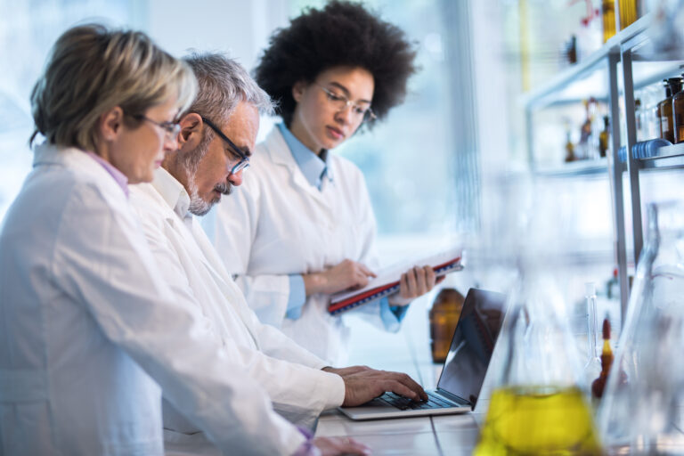 researchers in lab