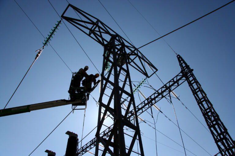 people working on power lines