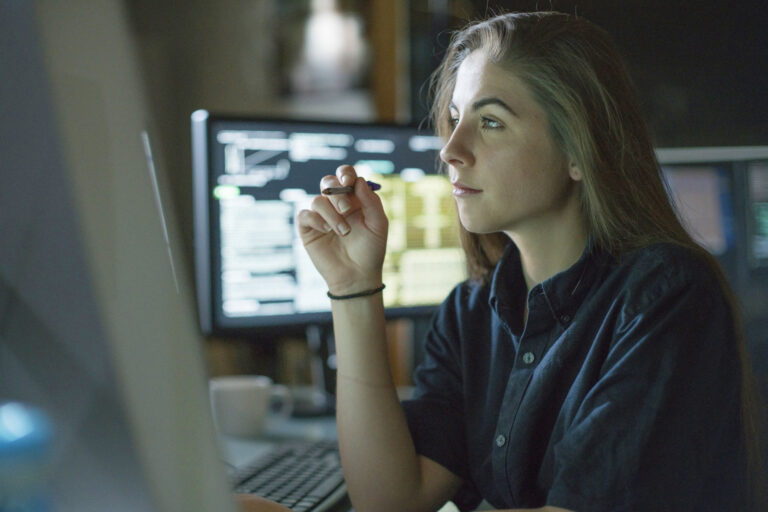 person looking thoughtfully at screen computer