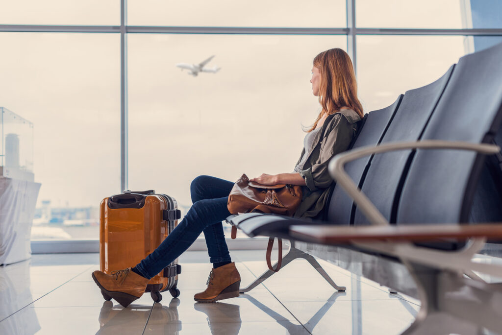 waiting at airport luggage plane take off 1200x801 d21b45d