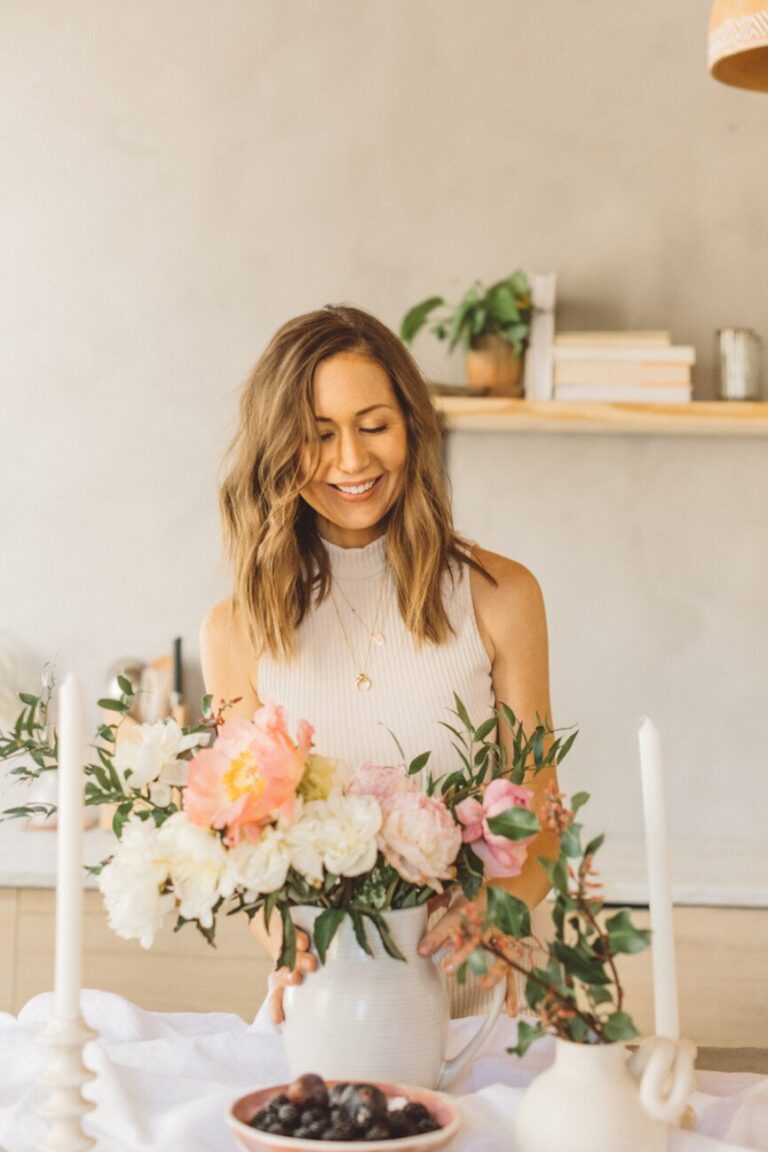 camille styles arranging flowers 865x1298