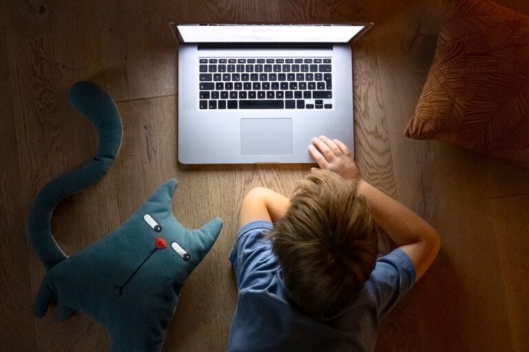 child watching internet videos on computer